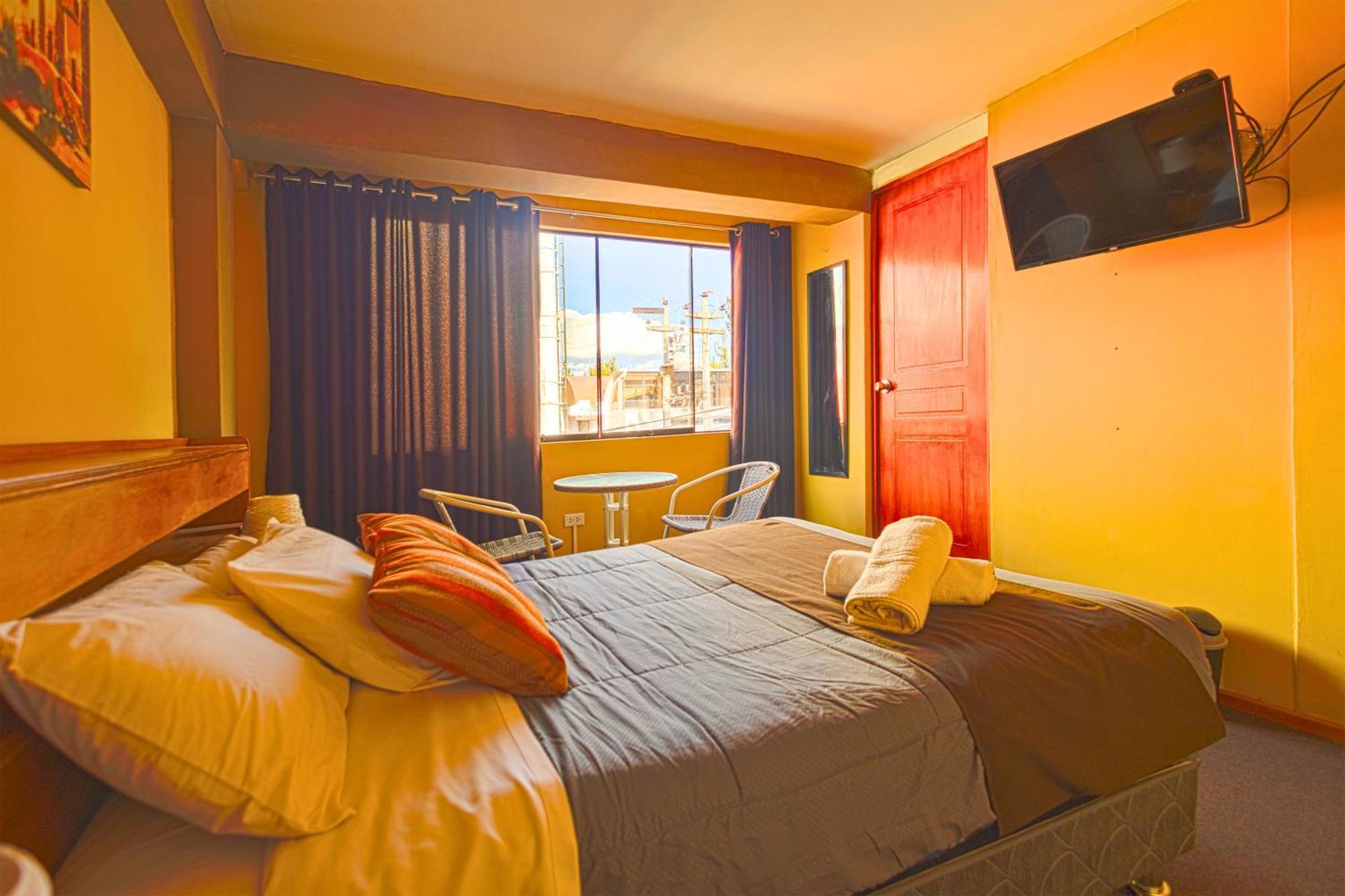 Chambre Lit Queen-Size Deluxe