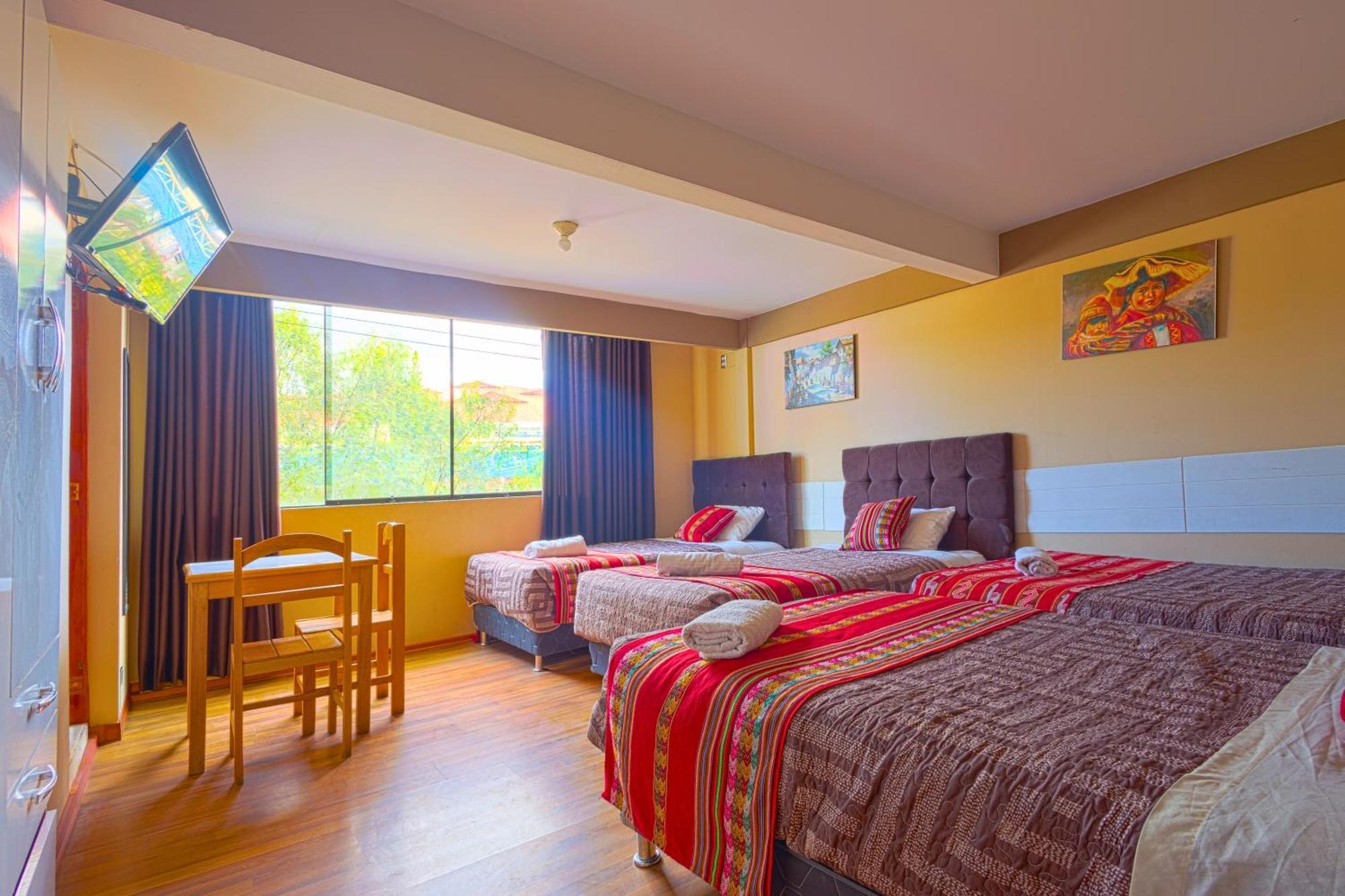 Chambre Quadruple avec Salle de Bains Privative